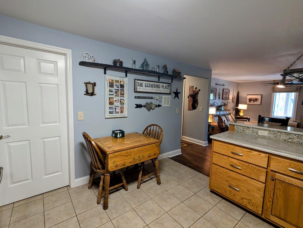 96 Cascade Trail, Unit 24 Fancy Gap, VA 24328 - Photo 8 of 18 a room with furniture and air hockey table