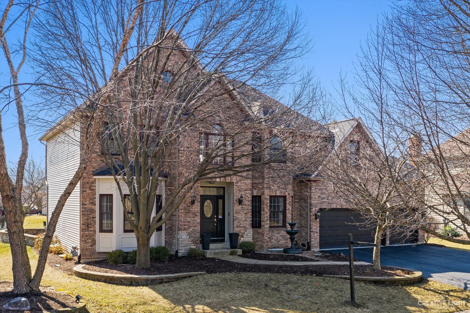 3812 Mistflower Lane Naperville, IL 60564 - Photo 1 of 49 a front view of a house with garden