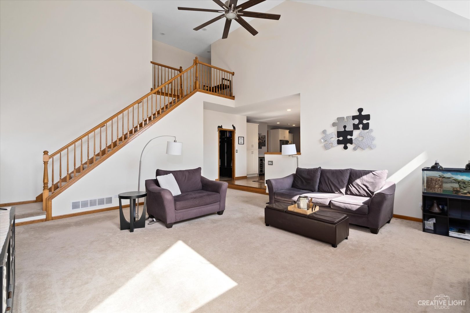 3812 Mistflower Lane Naperville, IL 60564 - Photo 11 of 49 a living room with furniture and a ceiling fan