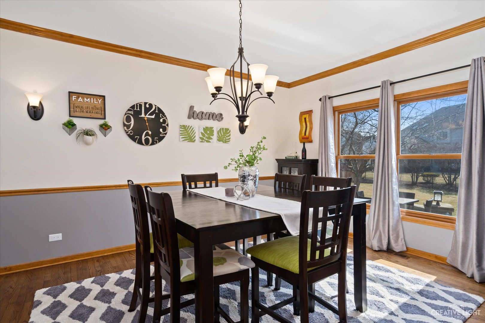3812 Mistflower Lane Naperville, IL 60564 - Photo 15 of 49 a view of a dining room with furniture window and wooden floor