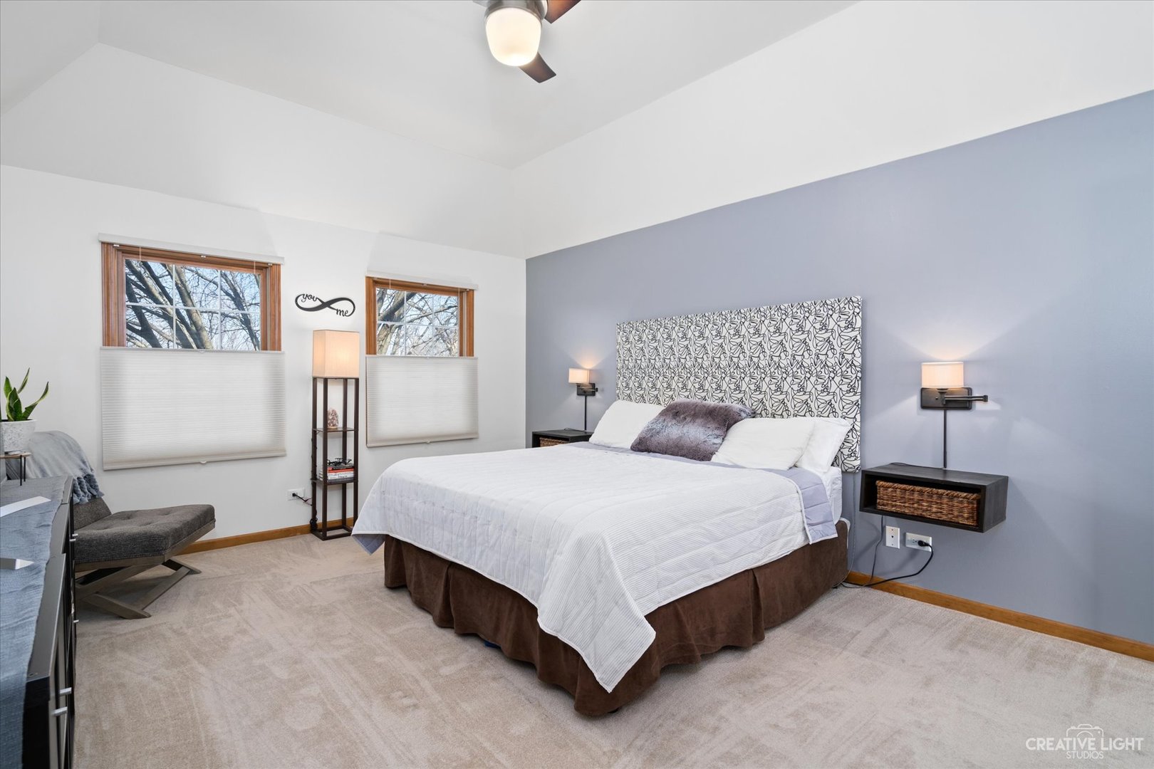 3812 Mistflower Lane Naperville, IL 60564 - Photo 19 of 49 a spacious bedroom with a bed and a couch