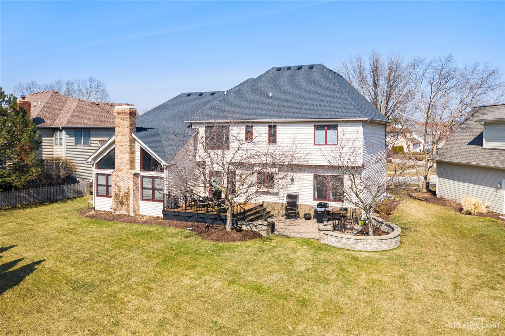 3812 Mistflower Lane Naperville, IL 60564 - Photo 38 of 49 a front view of a house with a yard patio and fire pit