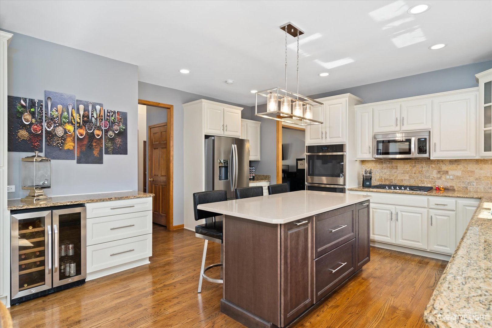 3812 Mistflower Lane Naperville, IL 60564 - Photo 4 of 49 a kitchen with stainless steel appliances a stove refrigerator sink and microwave