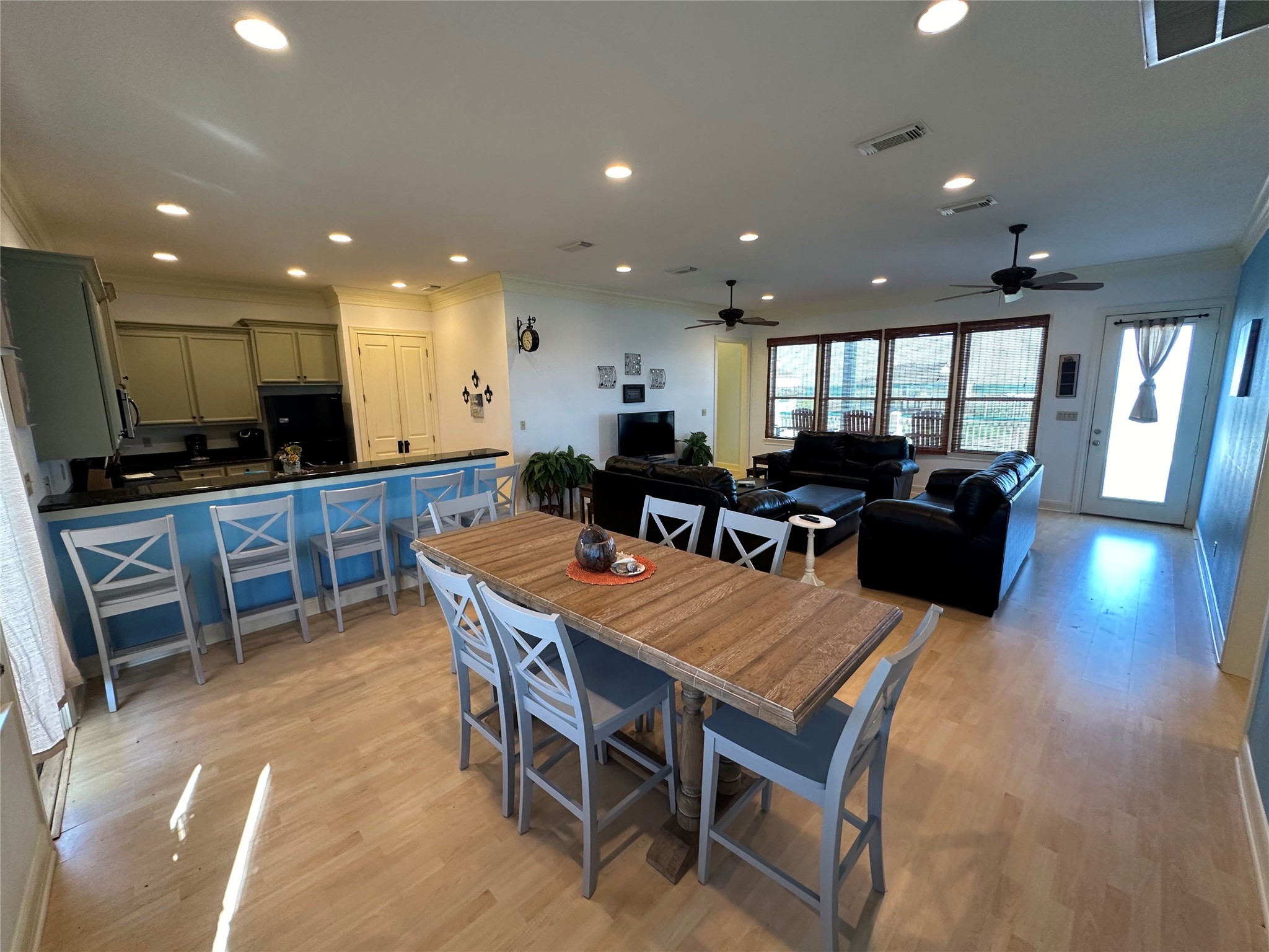 2529 Howell Crystal Beach, TX 77650 - Photo 12 of 41 a large kitchen with a table and chairs