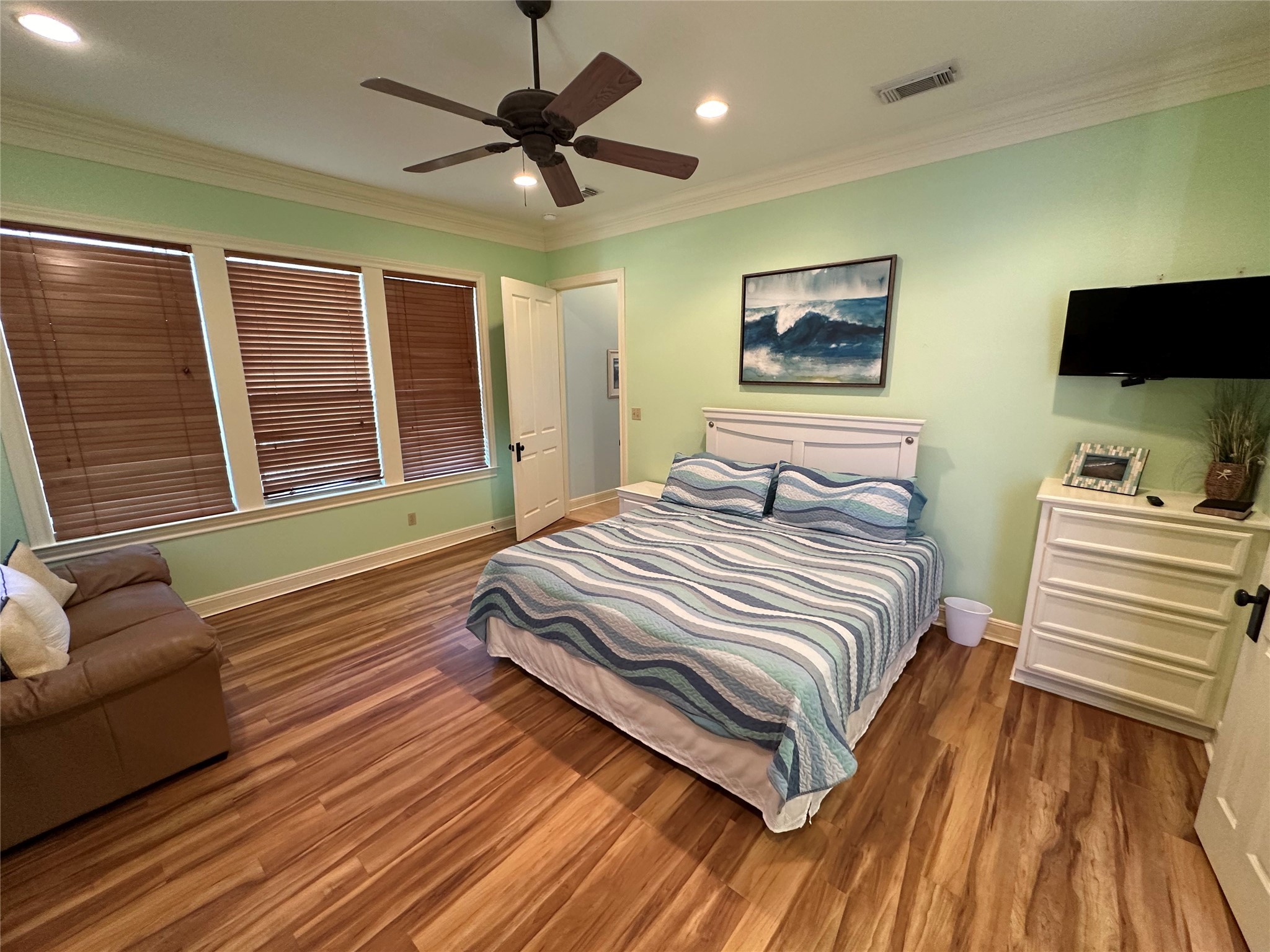 2529 Howell Crystal Beach, TX 77650 - Photo 21 of 41 a bedroom with a bed and a couch