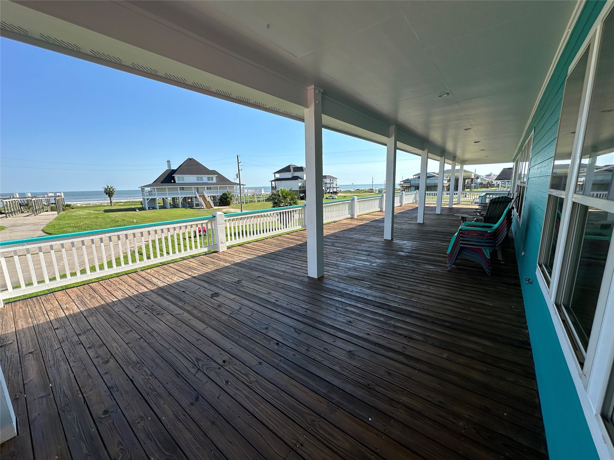 2529 Howell Crystal Beach, TX 77650 - Photo 4 of 41 a view of a balcony with wooden floor