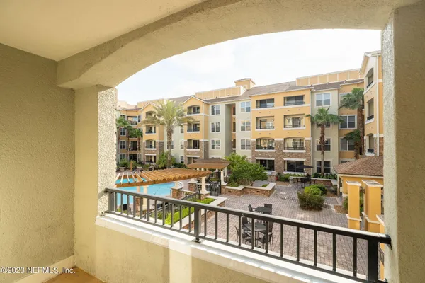 a view of balcony with patio