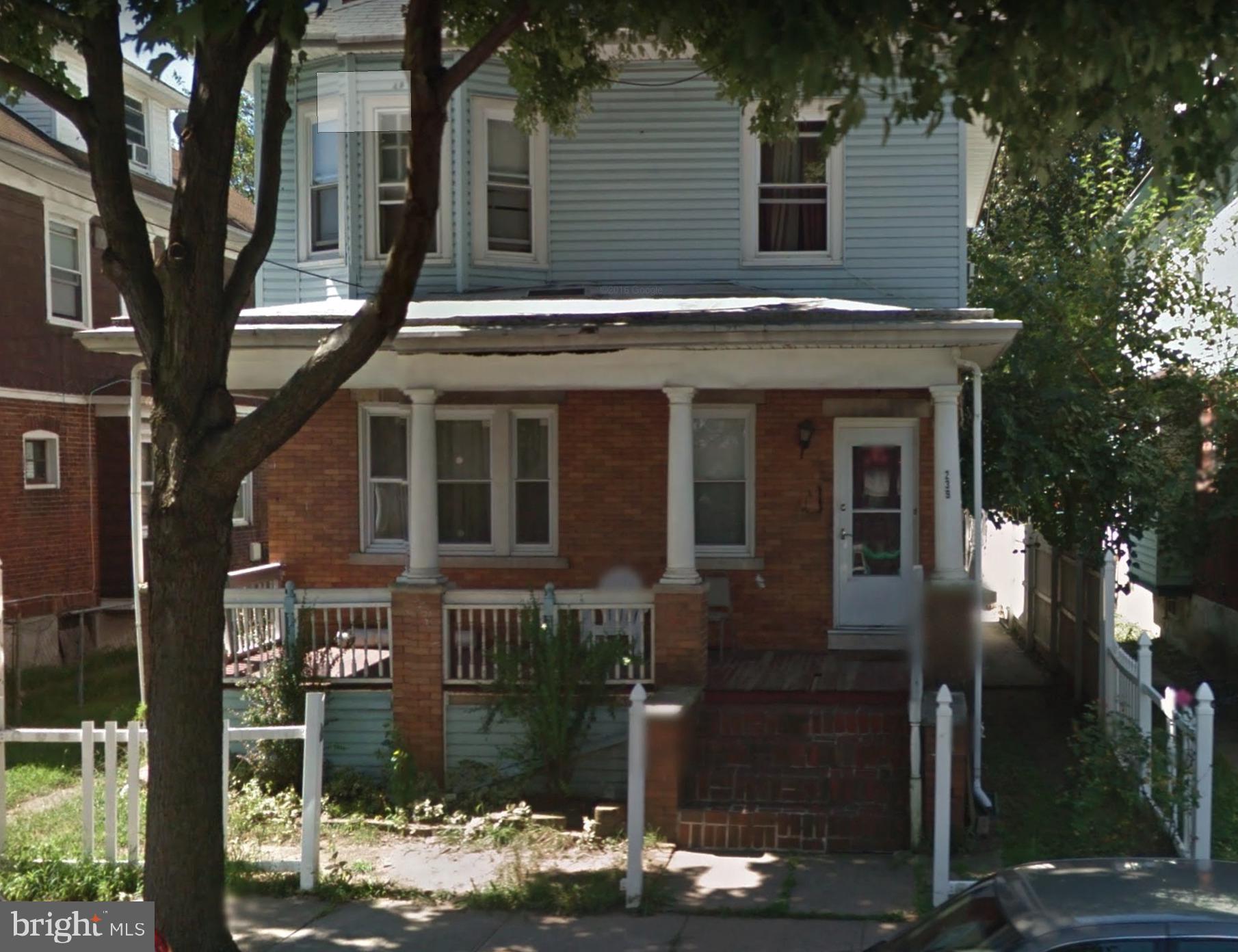 a front view of a house with lake view