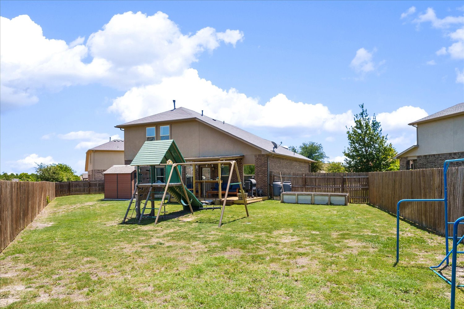 717 Kaluga Trail Leander, TX 78641 - Photo 29 of 40 a view of a house with a yard and chairs