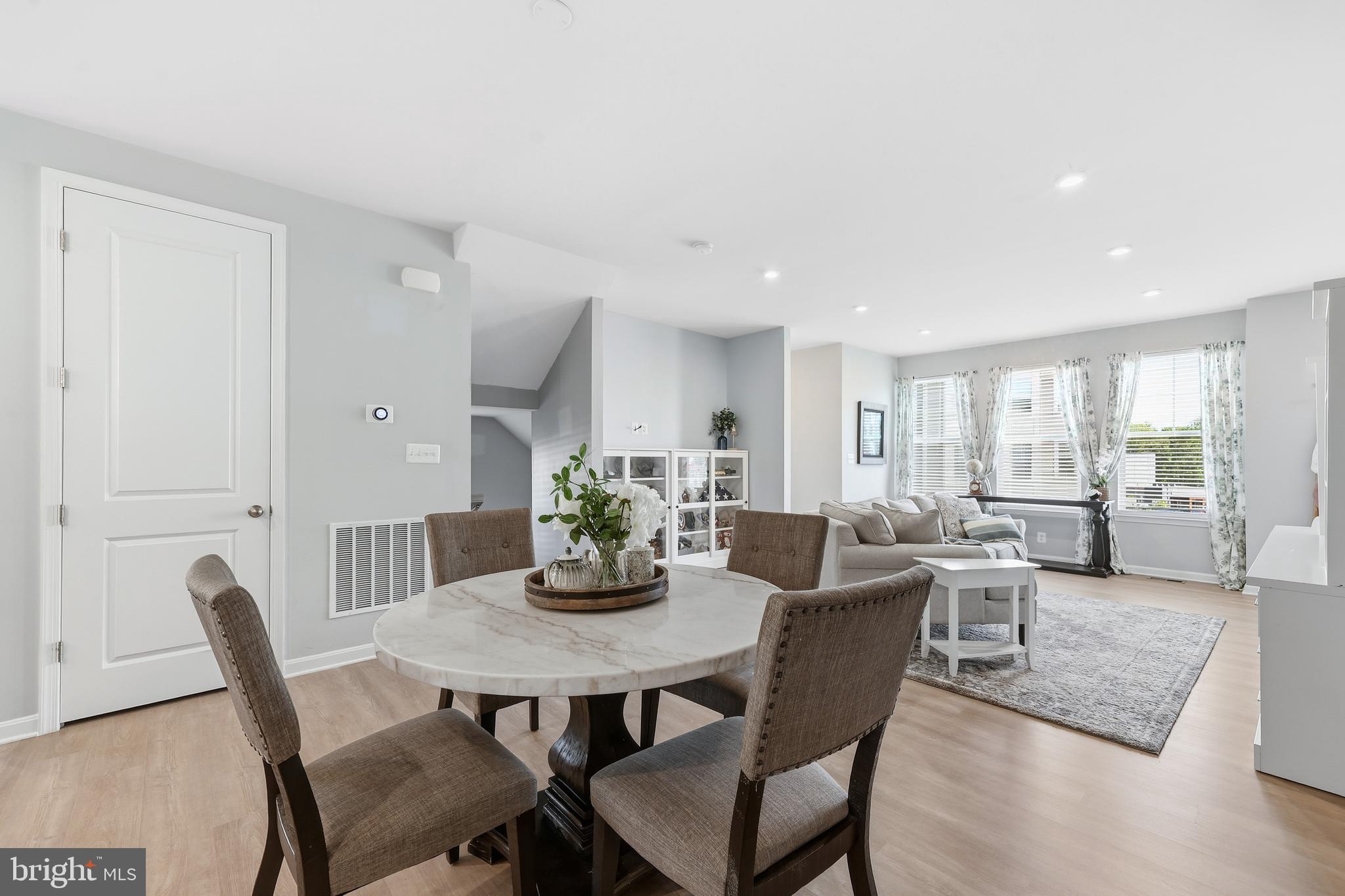 18319 Summit Pointe Drive Triangle, VA 22172 - Photo 11 of 40 a view of a dining room with furniture