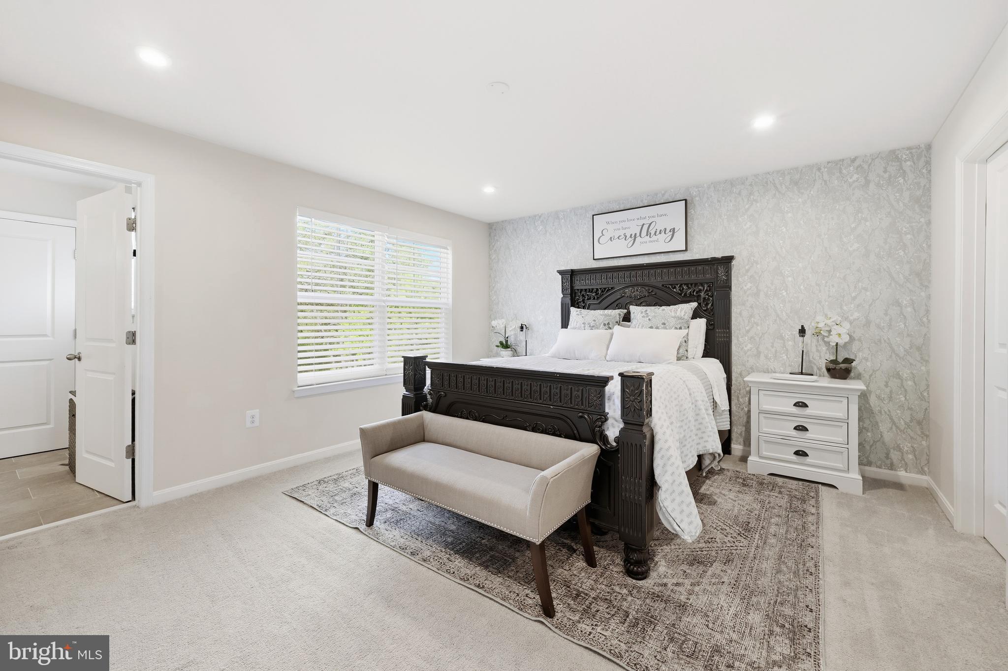 18319 Summit Pointe Drive Triangle, VA 22172 - Photo 13 of 40 a bedroom with furniture and a window