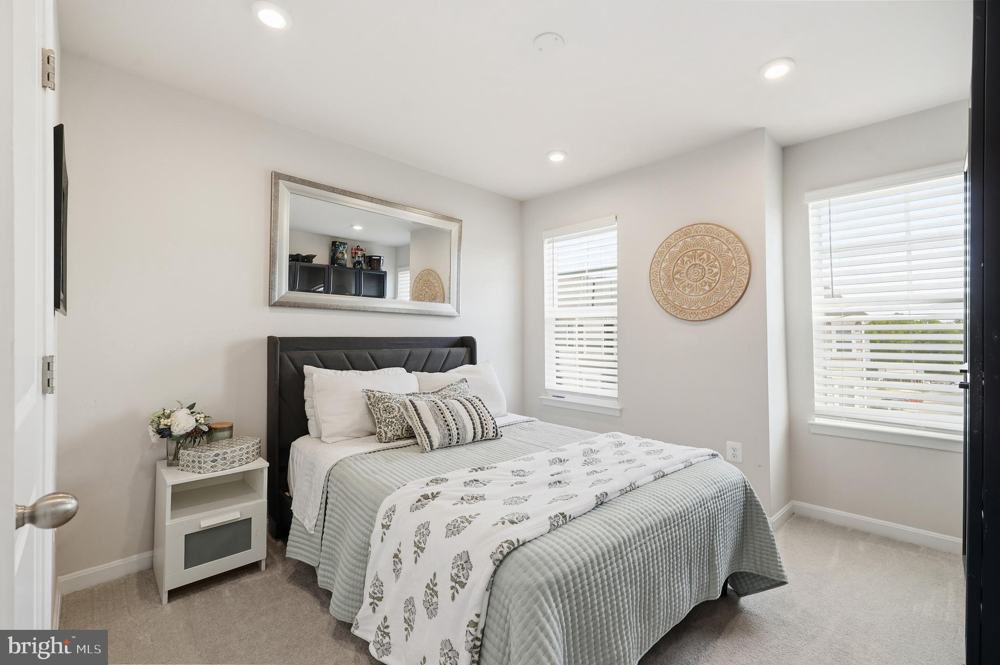 18319 Summit Pointe Drive Triangle, VA 22172 - Photo 16 of 40 a bedroom with a bed and a window