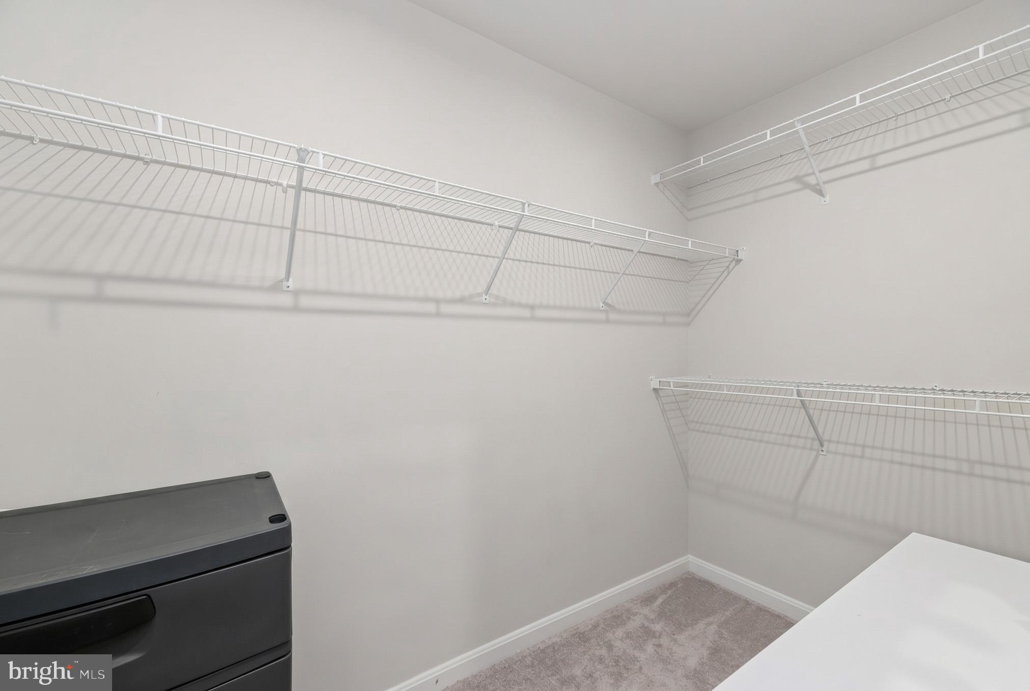 18319 Summit Pointe Drive Triangle, VA 22172 - Photo 31 of 40 a view of a room with racks on the wall