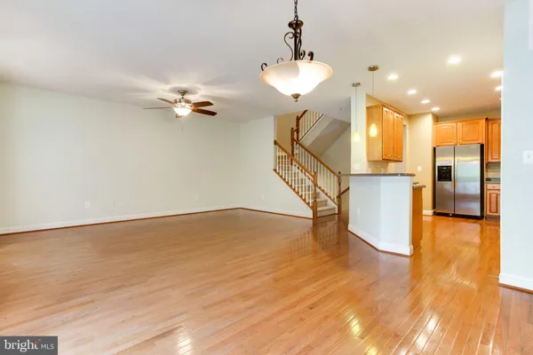 a view of an entryway with wooden floor