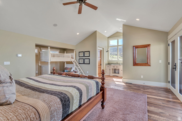 2579 Splendor Valley Road Kamas, UT 84036 - Photo 80 of 87 Bedroom featuring wood finished floors, access to exterior, ceiling fan, recessed lighting, and lofted ceiling
