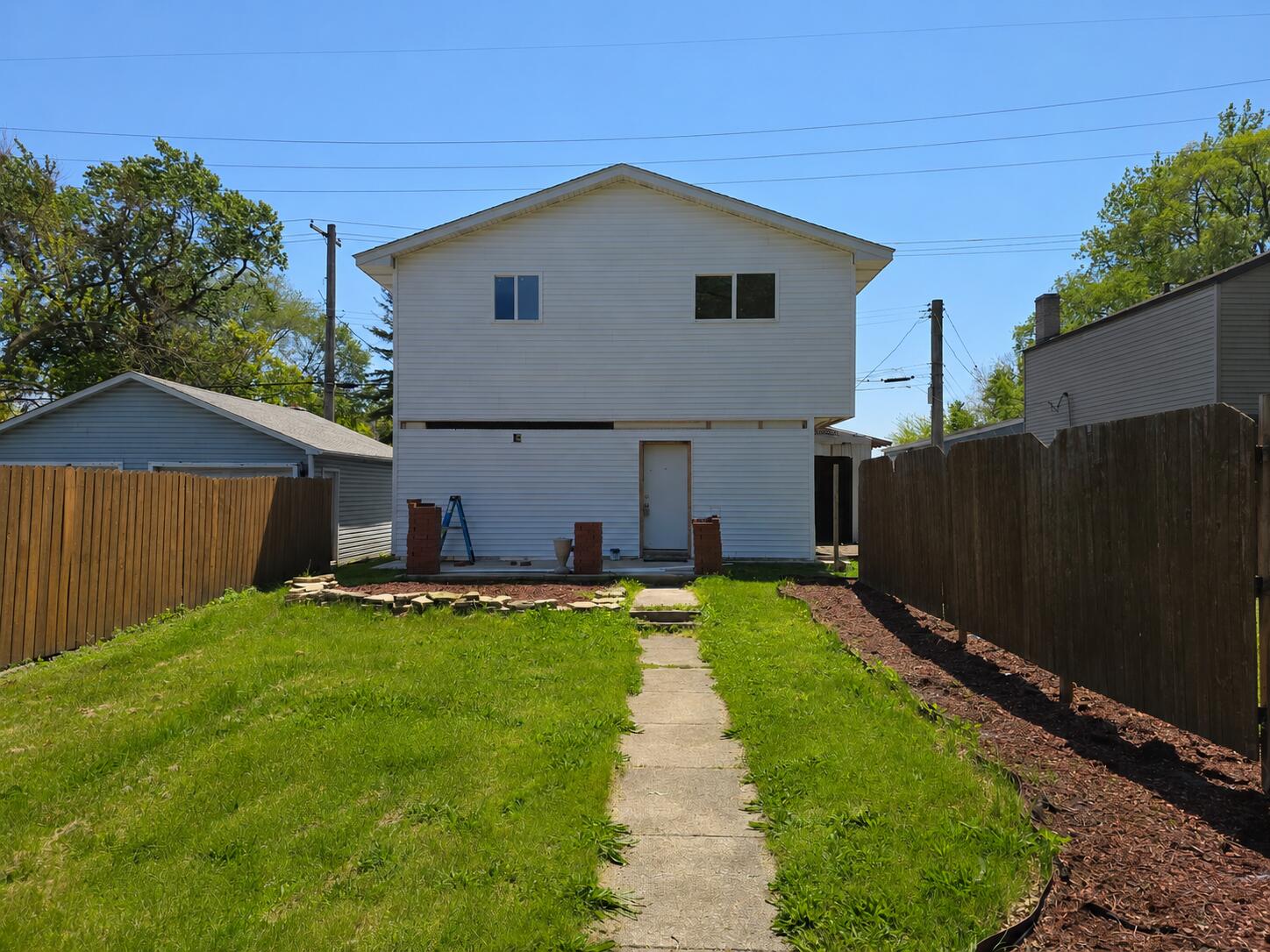 426 Cherry Street Hammond, IN 46324 - Photo 1 of 6 a front view of house with yard and car parked