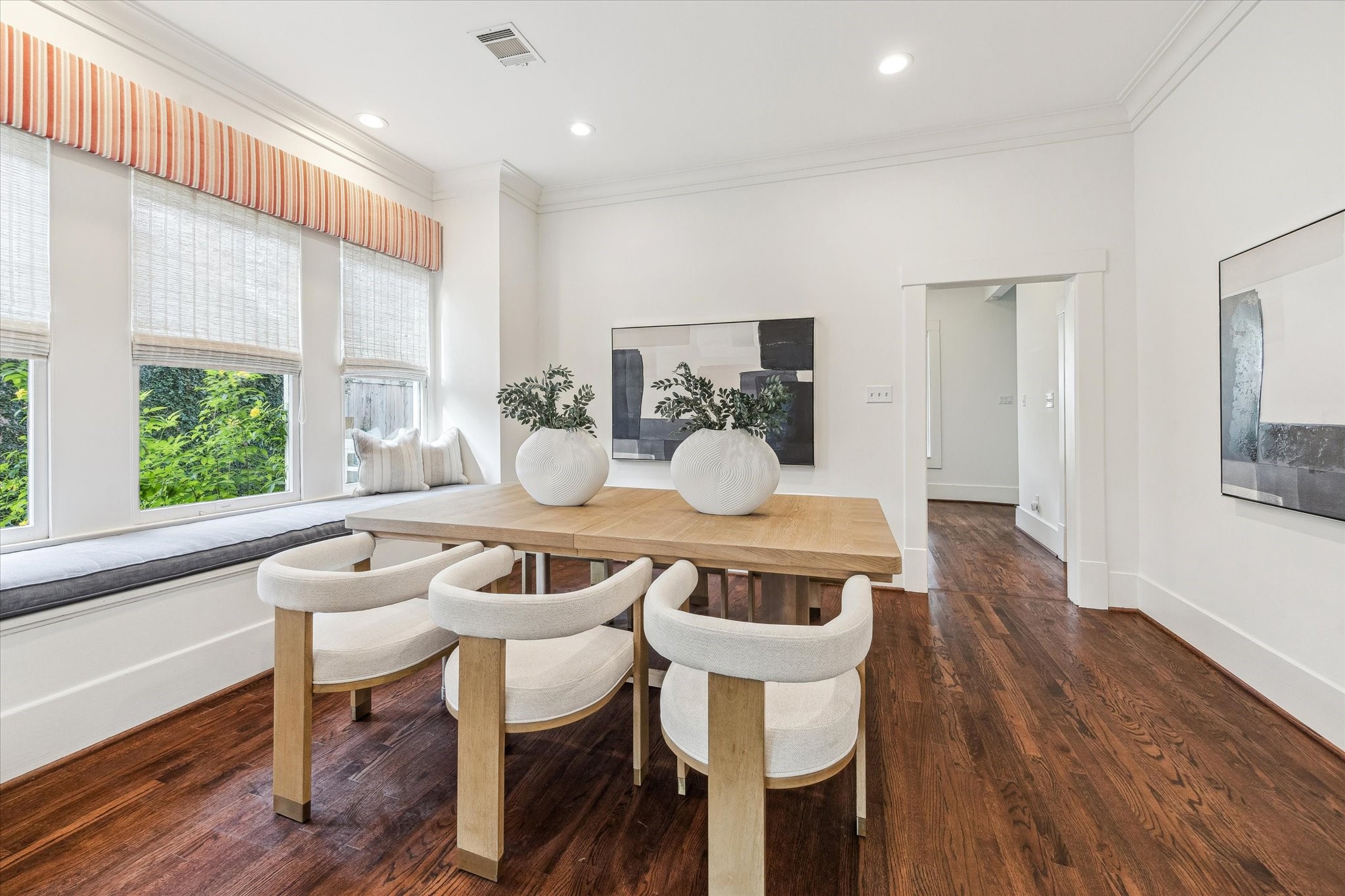 1506 Indiana Street Houston, TX 77006 - Photo 9 of 37 a dining room with furniture and wooden floor