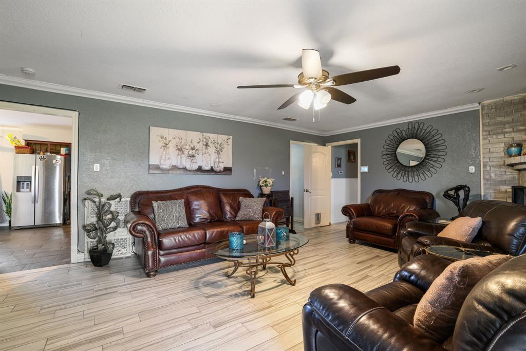 12475 Fm 2728 Terrell, TX 75161 - Photo 14 of 27 a living room with furniture and a wooden floor