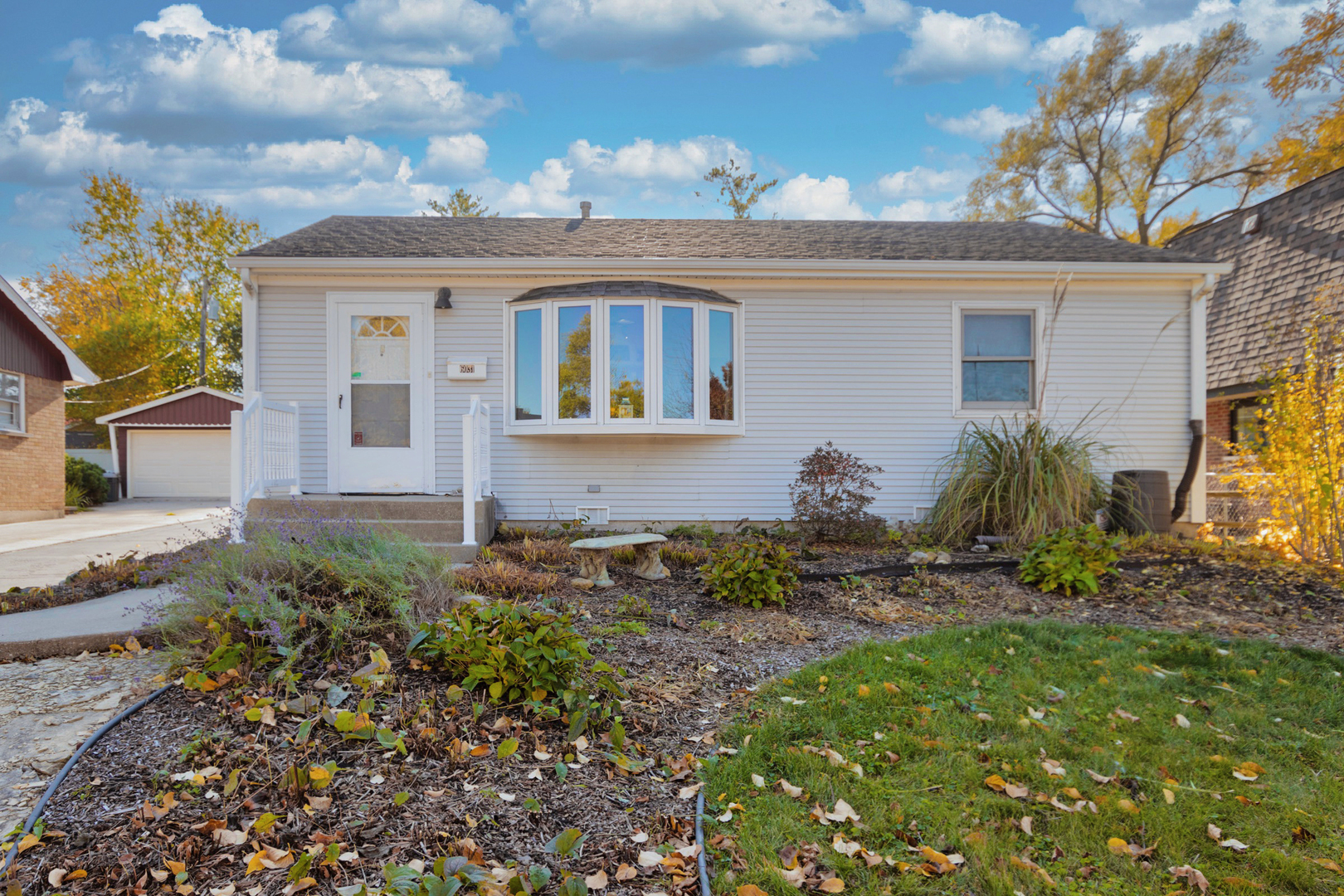6031 Washington Street Chicago Ridge, IL 60415 - Photo 1 of 1 a front view of a house with garden