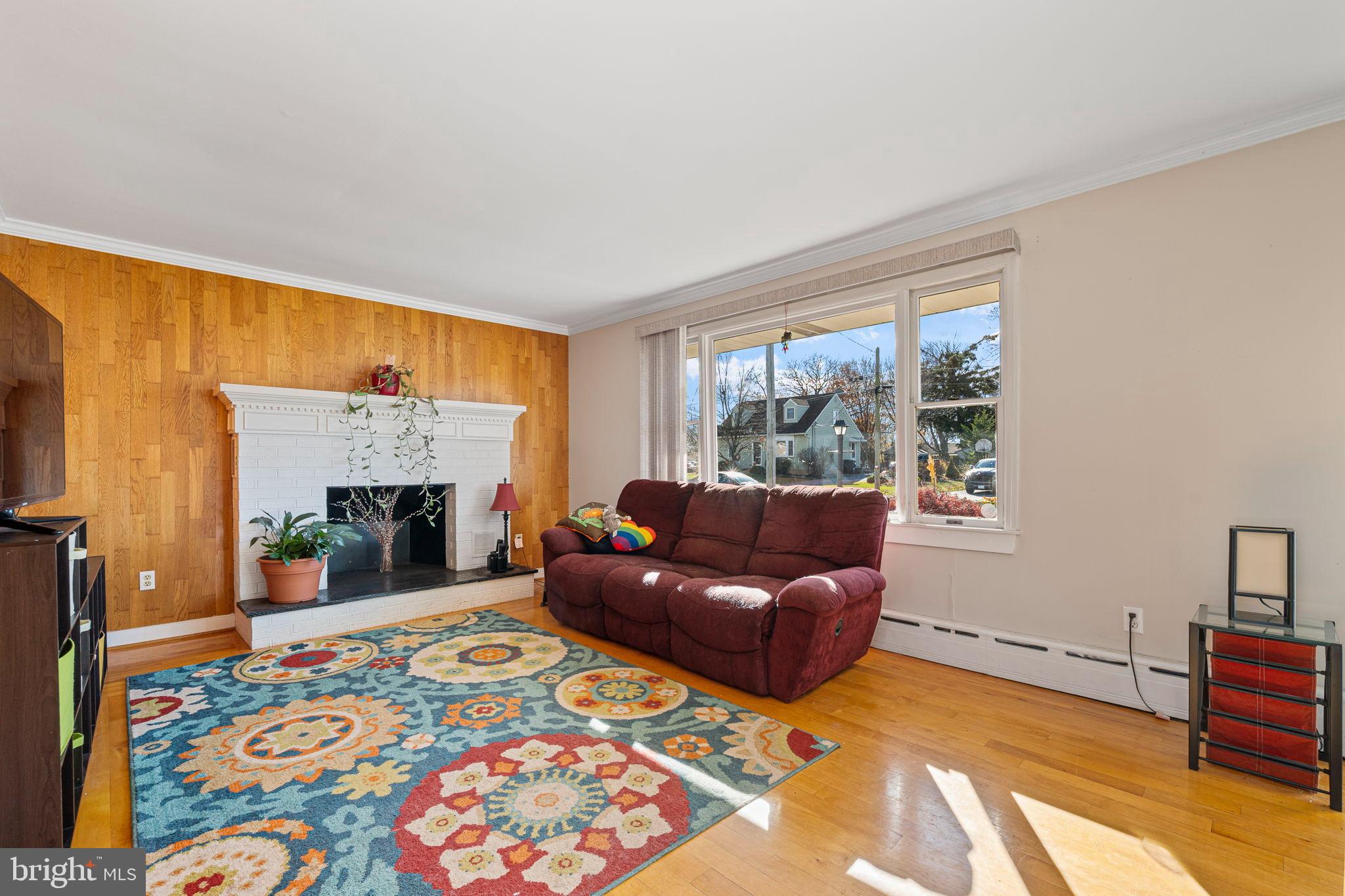 187 North Hazel Street Manheim, PA 17545 - Photo 2 of 28 a living room with furniture and a fireplace