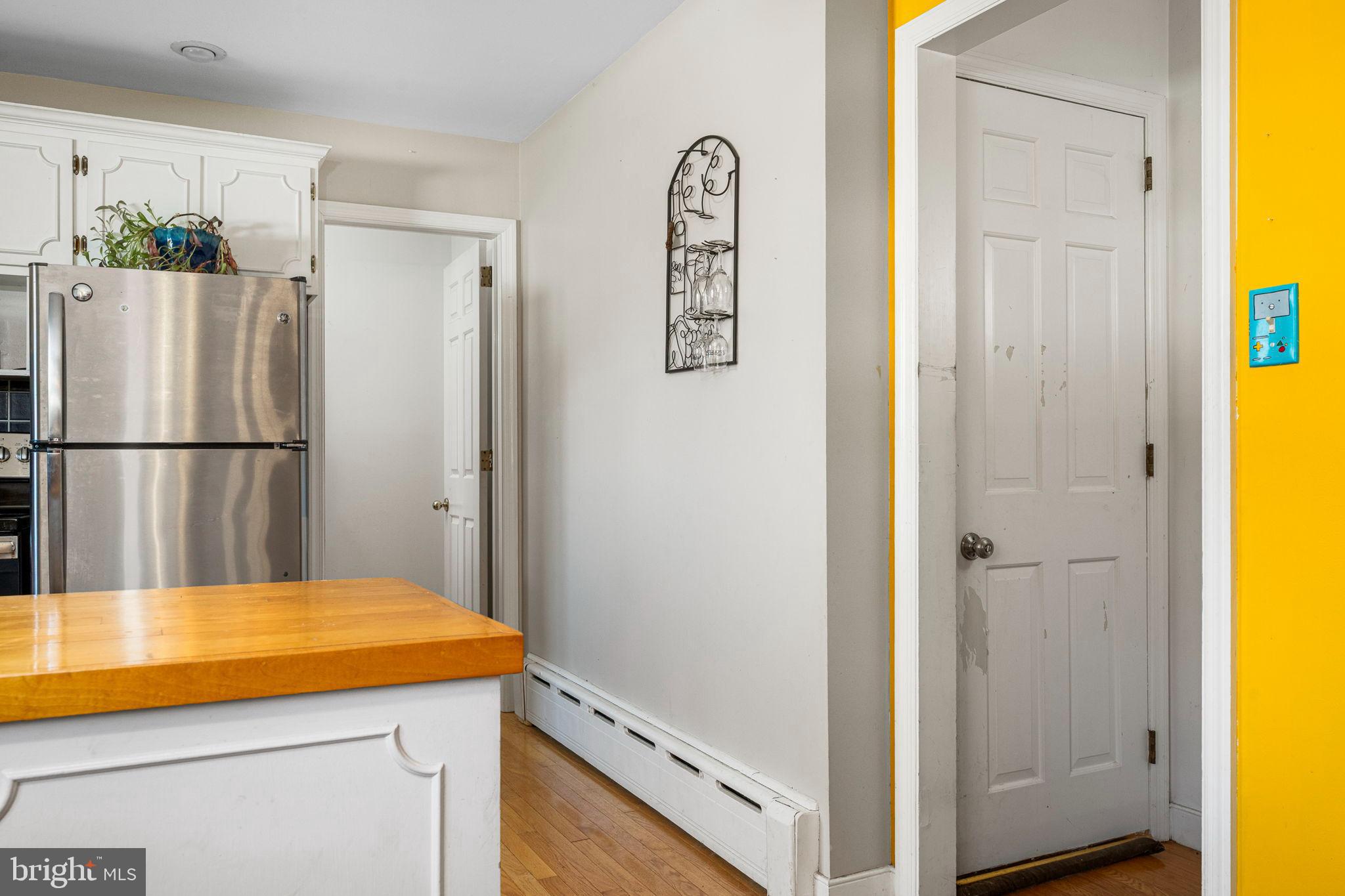 187 North Hazel Street Manheim, PA 17545 - Photo 10 of 28 a room with a refrigerator and couch