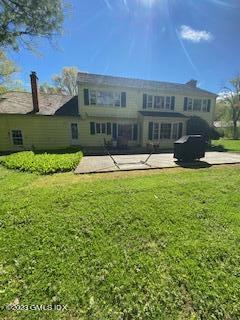 23 Copper Beech Road Greenwich, CT 06830 - Photo 13 of 15 a view of house with yard and outdoor seating