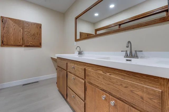 a sink with a mirror