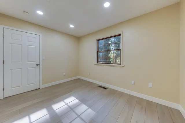 an empty room with windows