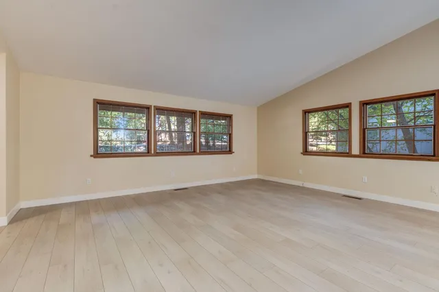 an empty room with windows