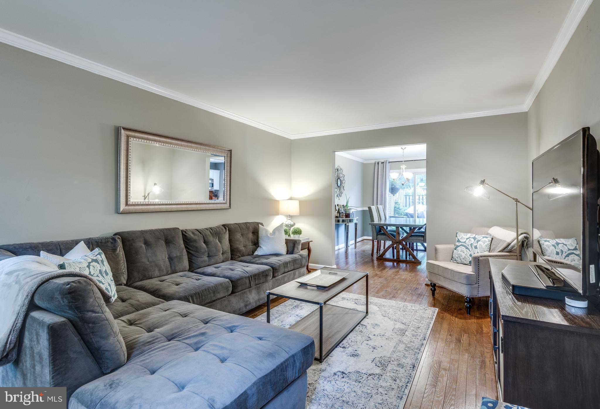 1804 Golf View Court Reston, VA 20190 - Photo 2 of 30 a living room with furniture and wooden floor