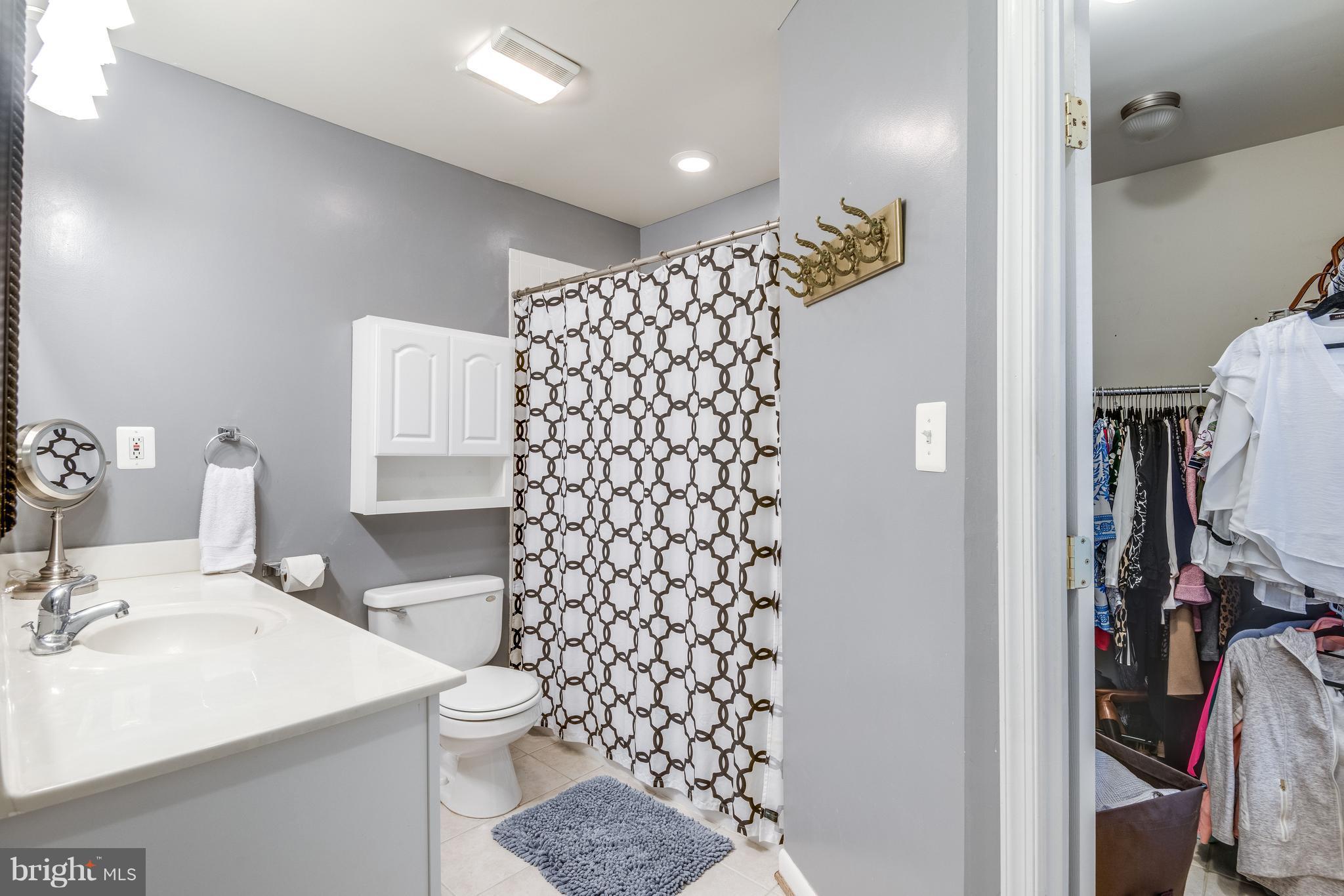 1804 Golf View Court Reston, VA 20190 - Photo 11 of 30 a bathroom with a sink toilet and shower