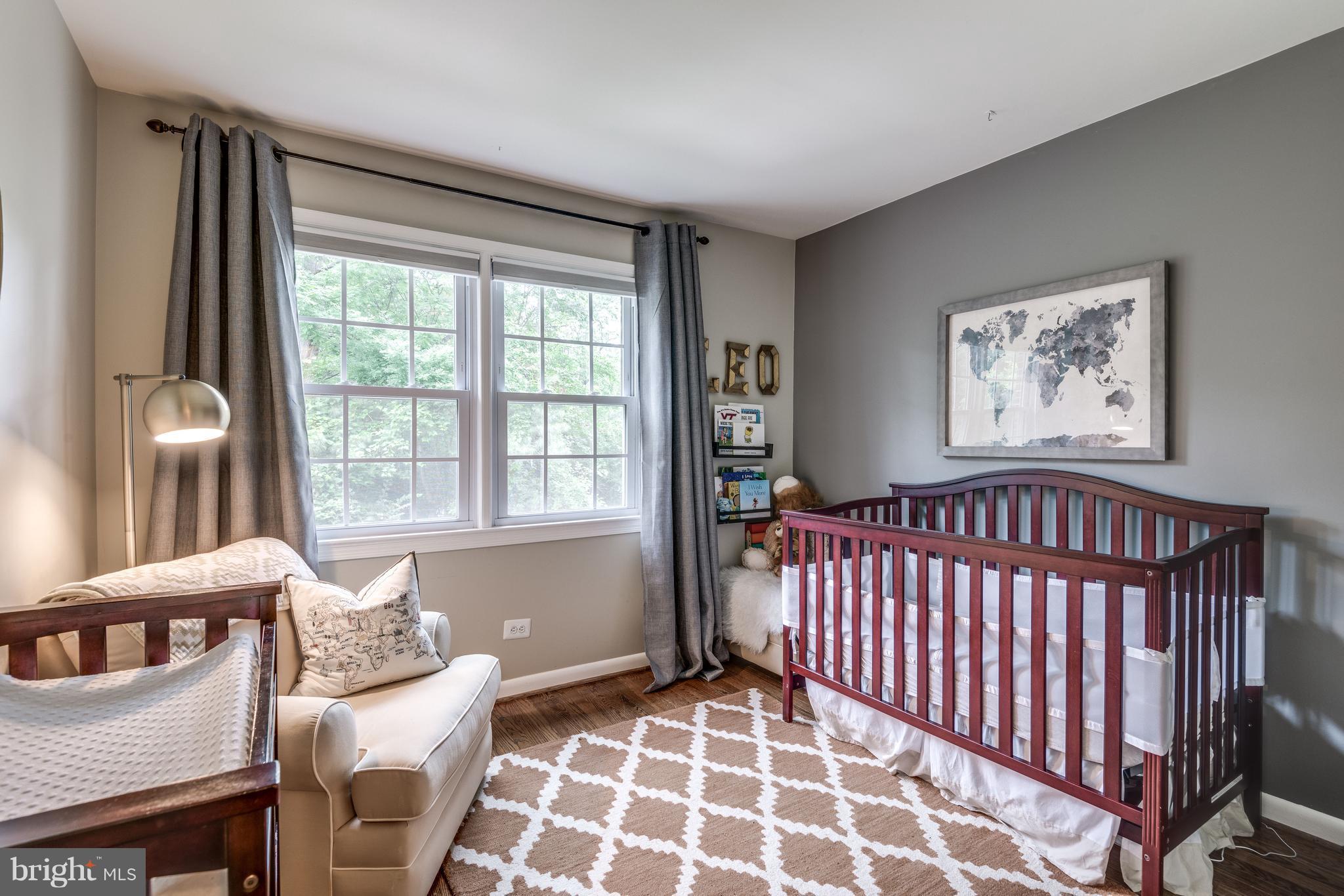 1804 Golf View Court Reston, VA 20190 - Photo 13 of 30 a bedroom with furniture and a window
