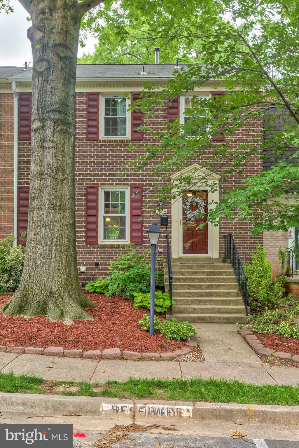 1804 Golf View Court Reston, VA 20190 - Photo 25 of 30 a front view of a house with a yard