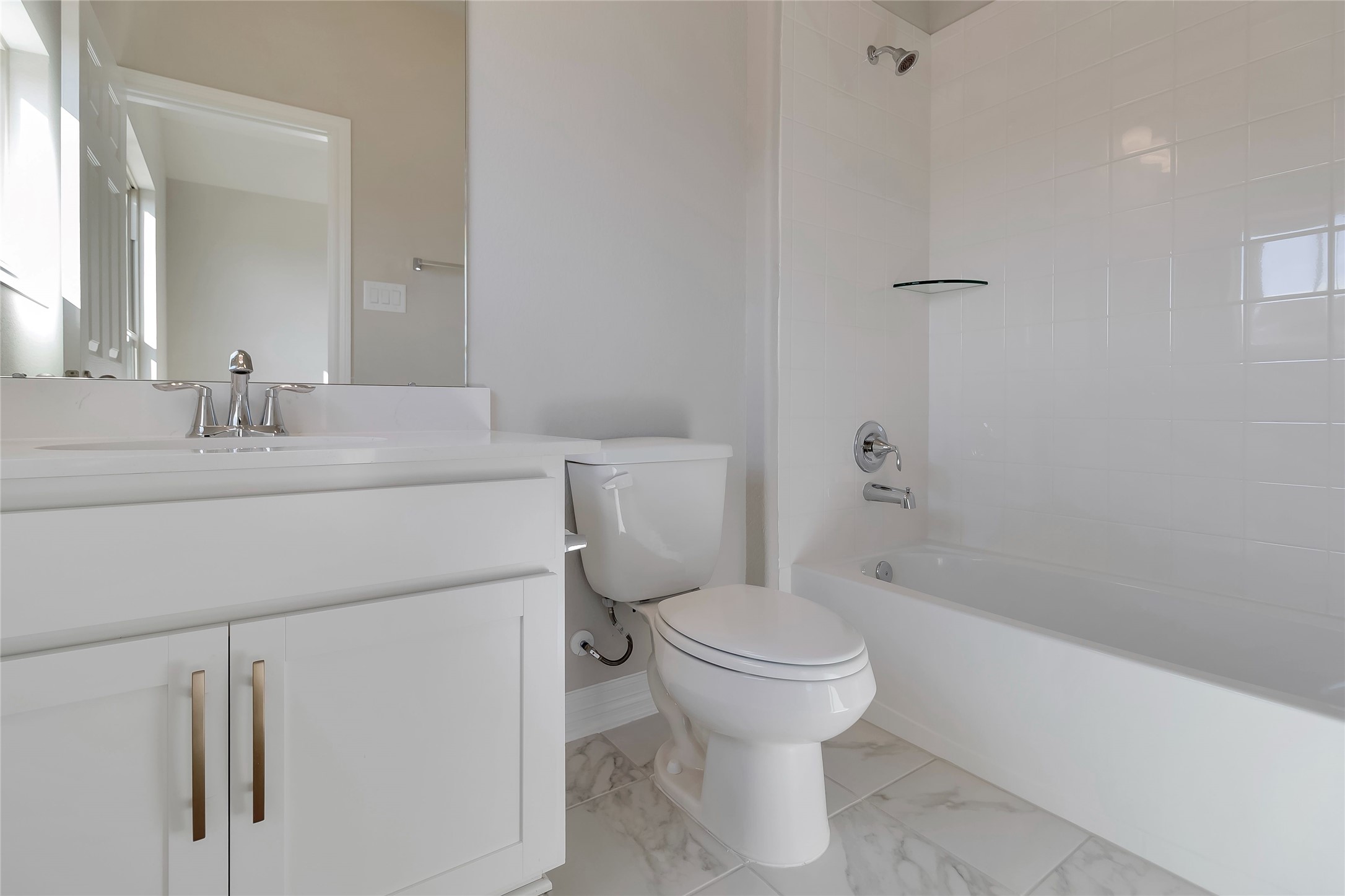 30827 Swift Hill Waller, TX 77484 - Photo 14 of 19 a bathroom with a sink toilet vanity and shower