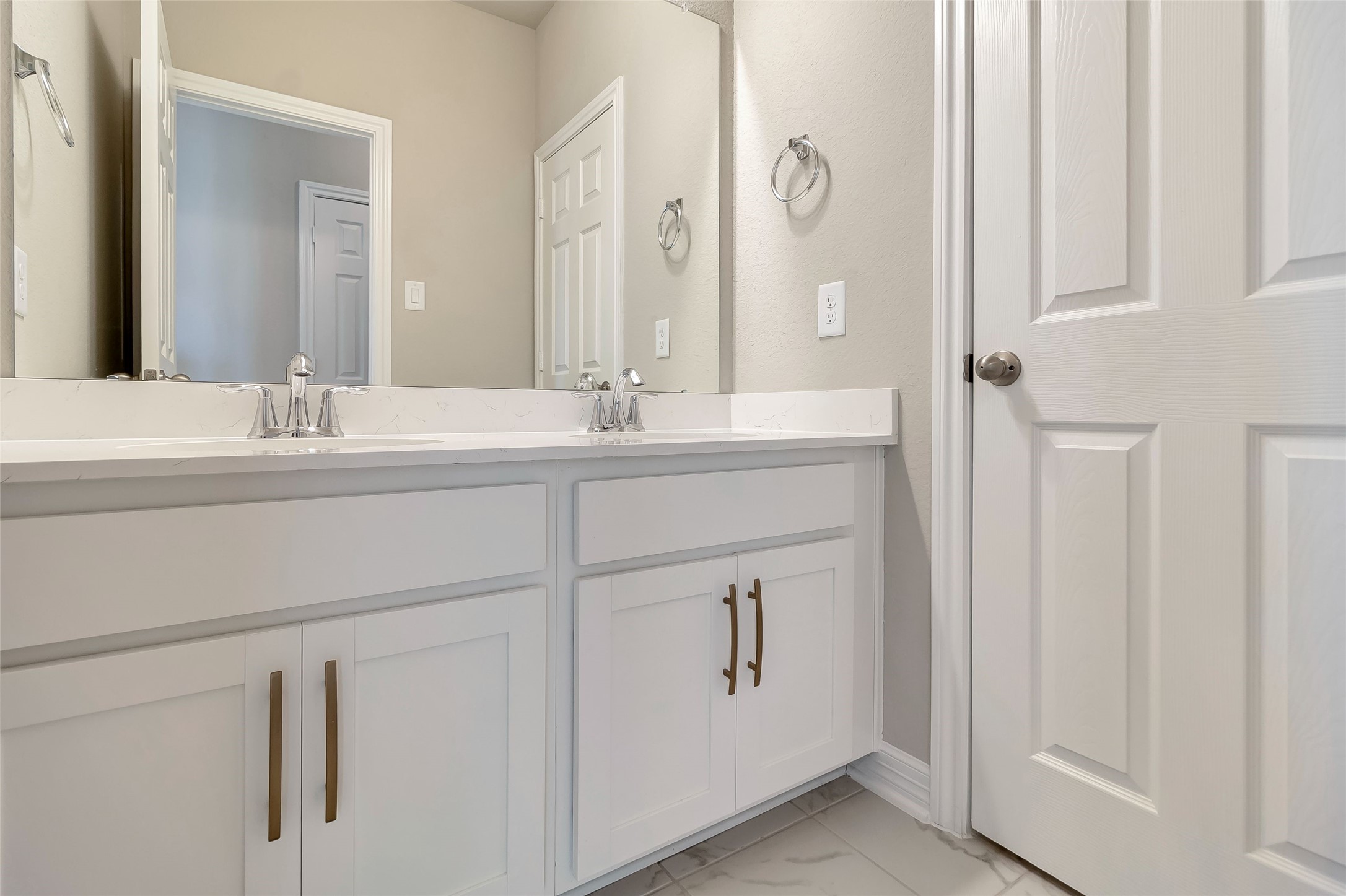 30827 Swift Hill Waller, TX 77484 - Photo 10 of 19 a bathroom with a double vanity sink and mirror