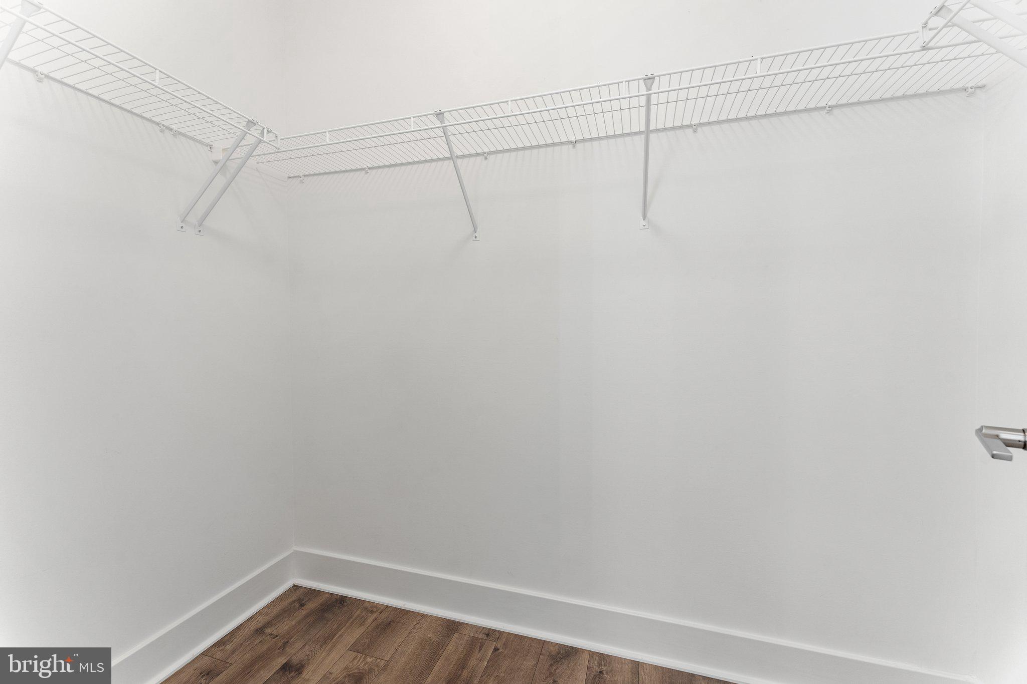 1876 Michael Faraday Drive Reston, VA 20190 - Photo 34 of 58 Primary walk-in closet
