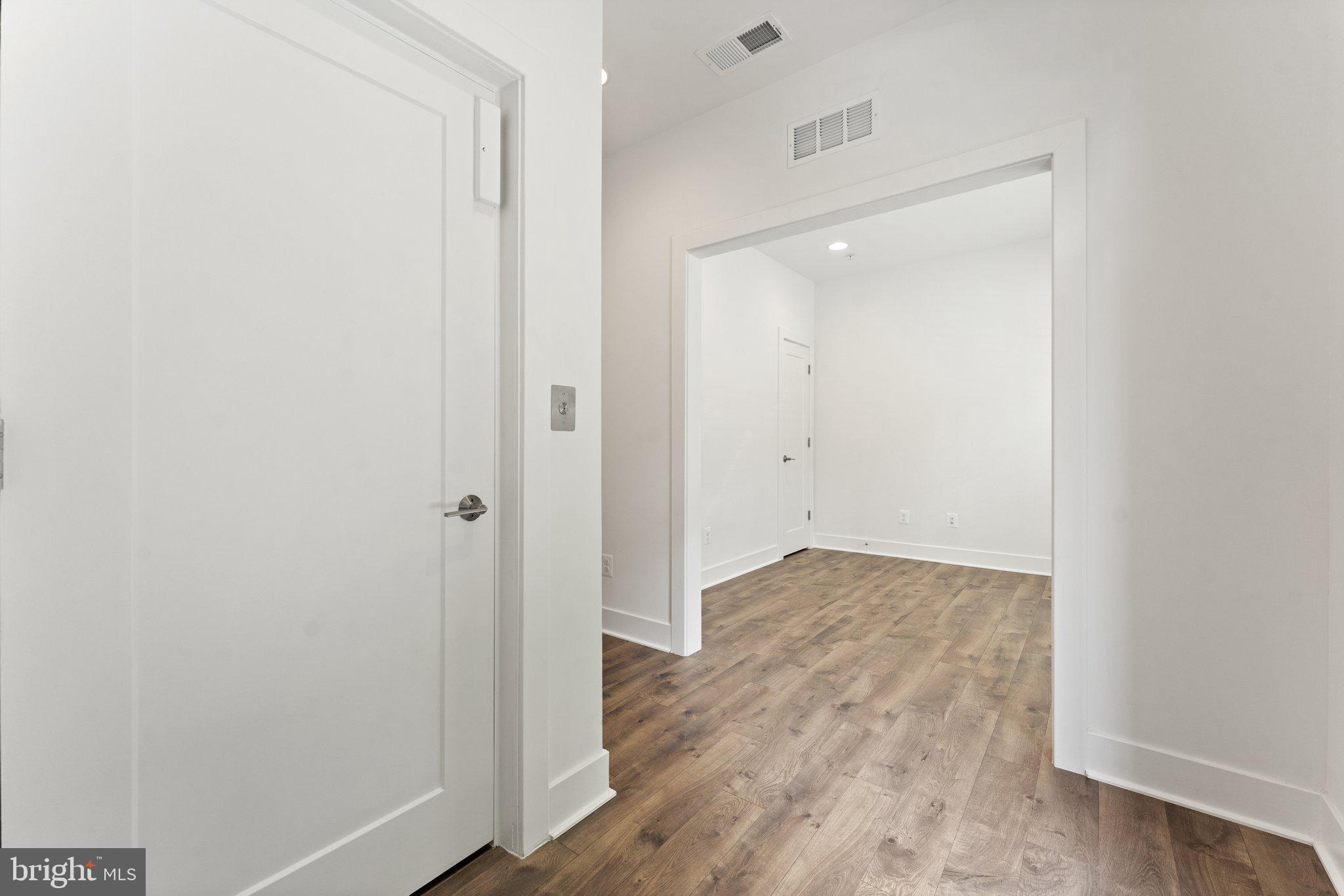 1876 Michael Faraday Drive Reston, VA 20190 - Photo 9 of 58 lower level elevator view to living room