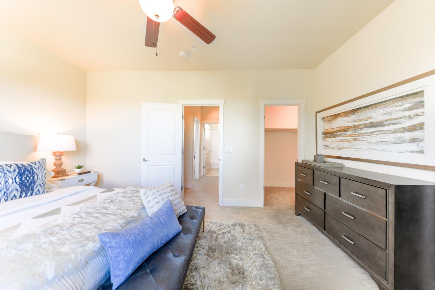 1095 Interlaken Terrace Sunnyvale, CA 94089 - Photo 12 of 25 a bedroom with a bed and a dresser