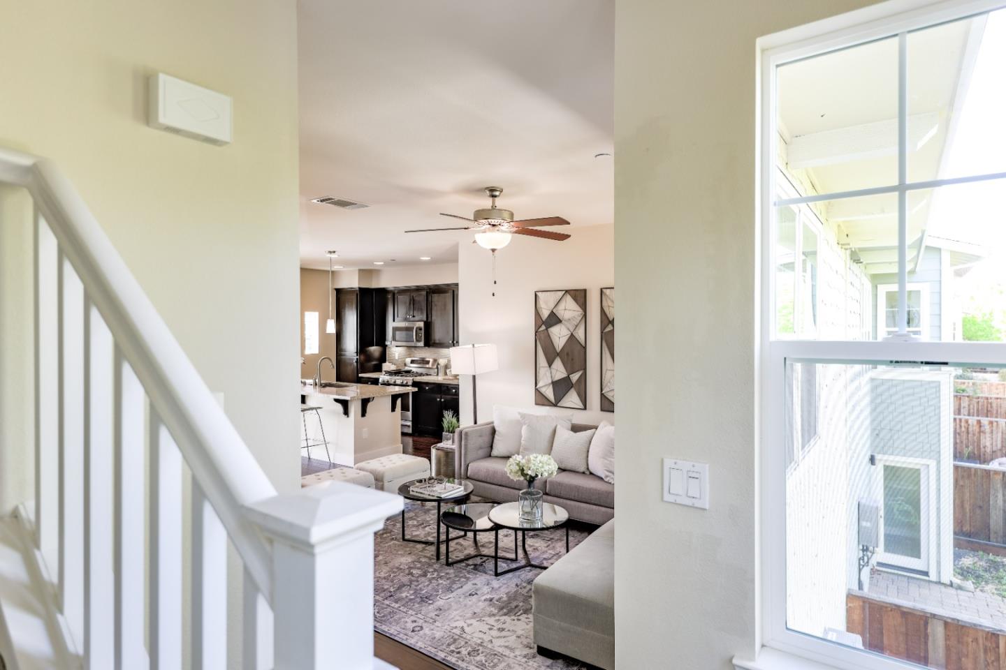1095 Interlaken Terrace Sunnyvale, CA 94089 - Photo 5 of 25 a living room with furniture a fireplace and a large window