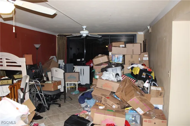 a room with lots of furniture and clutter