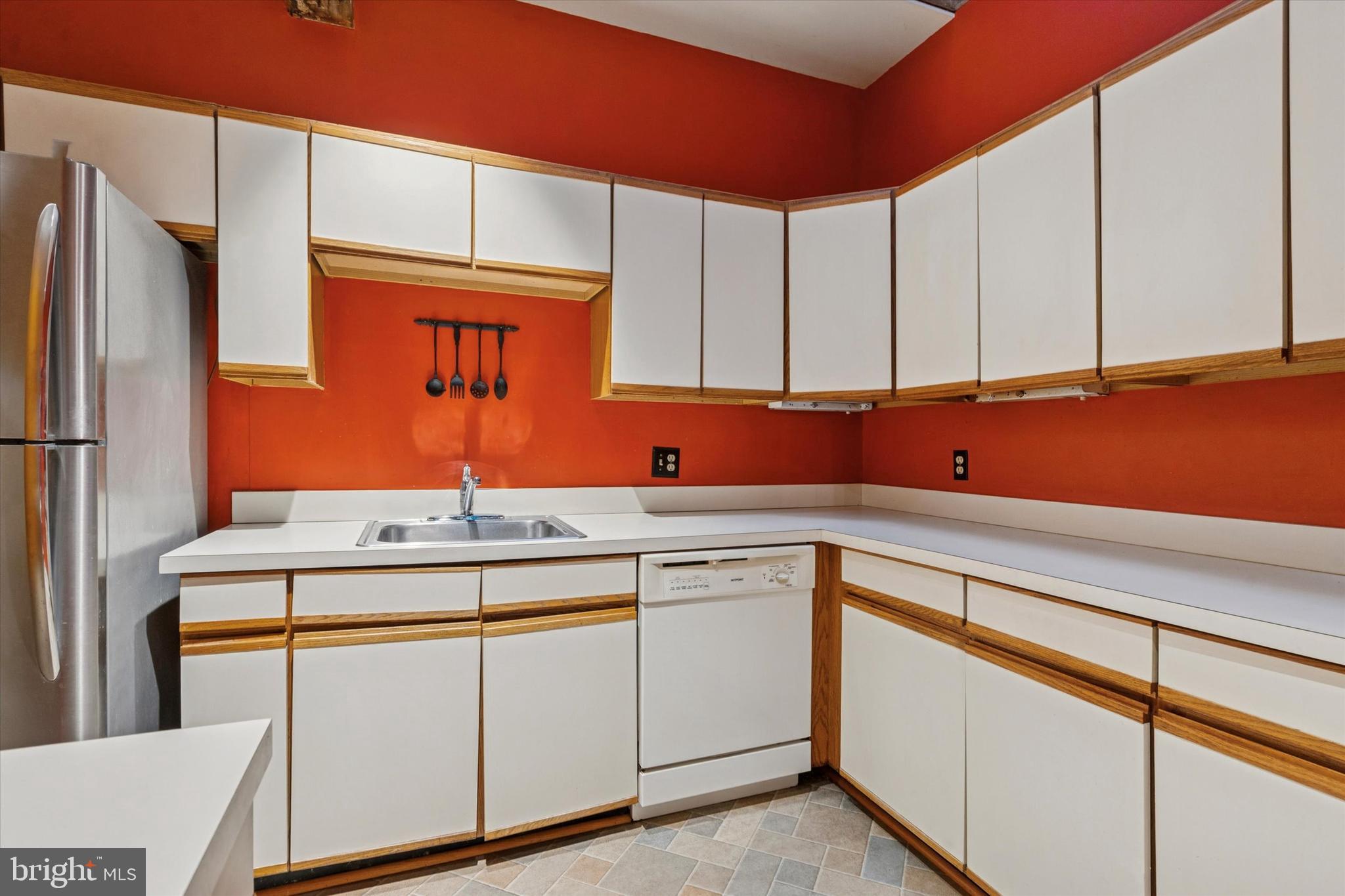 409 Lancaster Avenue Lancaster, PA 17603 - Photo 15 of 52 a kitchen with stainless steel appliances granite countertop a sink and cabinets