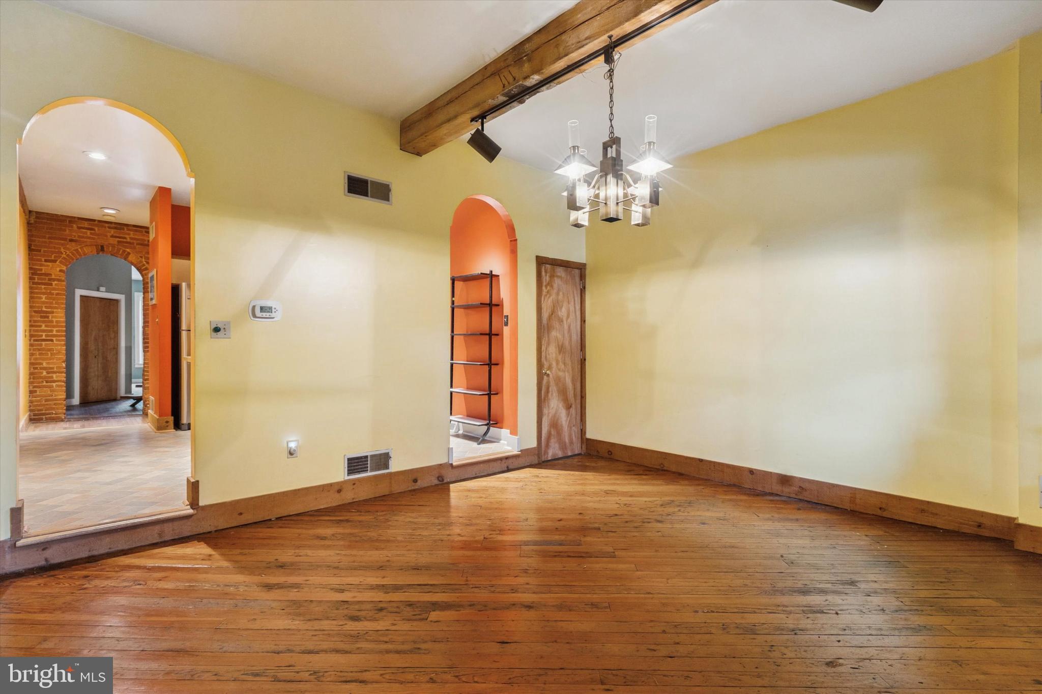 409 Lancaster Avenue Lancaster, PA 17603 - Photo 21 of 52 wooden floor in an empty room with a window