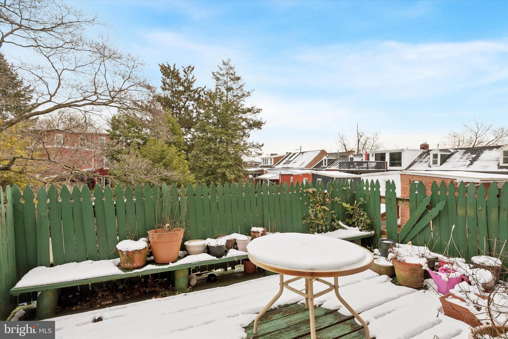 409 Lancaster Avenue Lancaster, PA 17603 - Photo 35 of 52 a view of a patio with couches table and chairs and potted plants