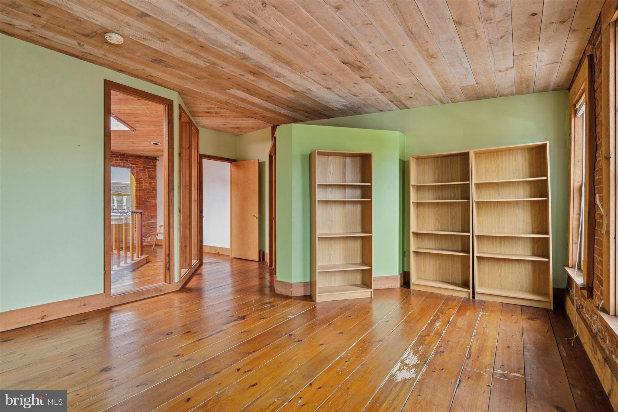 409 Lancaster Avenue Lancaster, PA 17603 - Photo 44 of 52 a view of empty room with wooden floor and fan