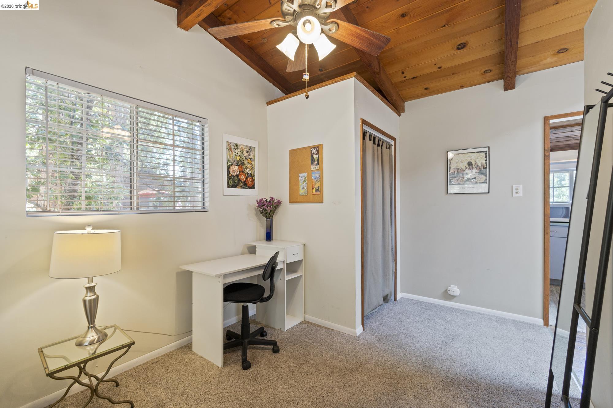 21815 Confidence Road Twain Harte, CA 95383 - Photo 14 of 30 a view of a workspace with furniture and a window