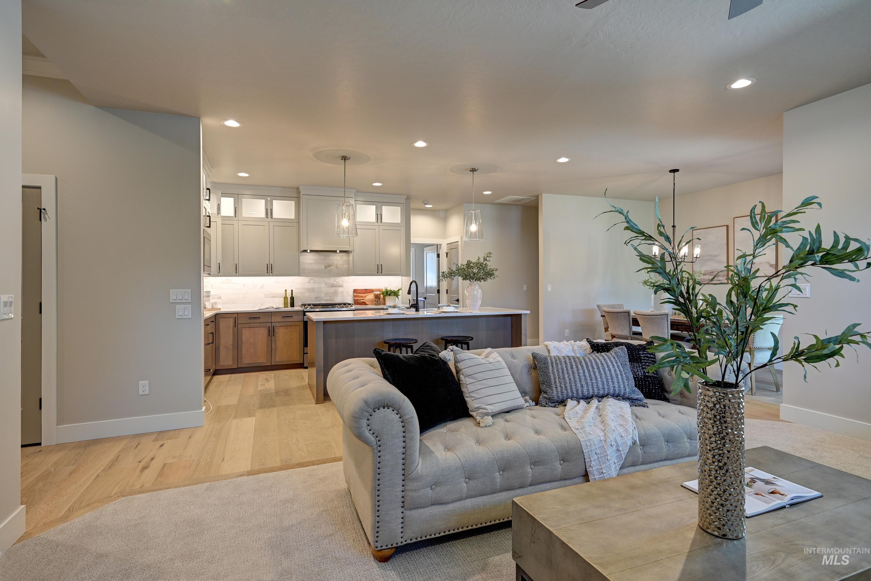 1469 North Parkshire Way Meridian, ID 83642 - Photo 14 of 43 Living room featuring recessed lighting, light wood finished floors, and ceiling fan