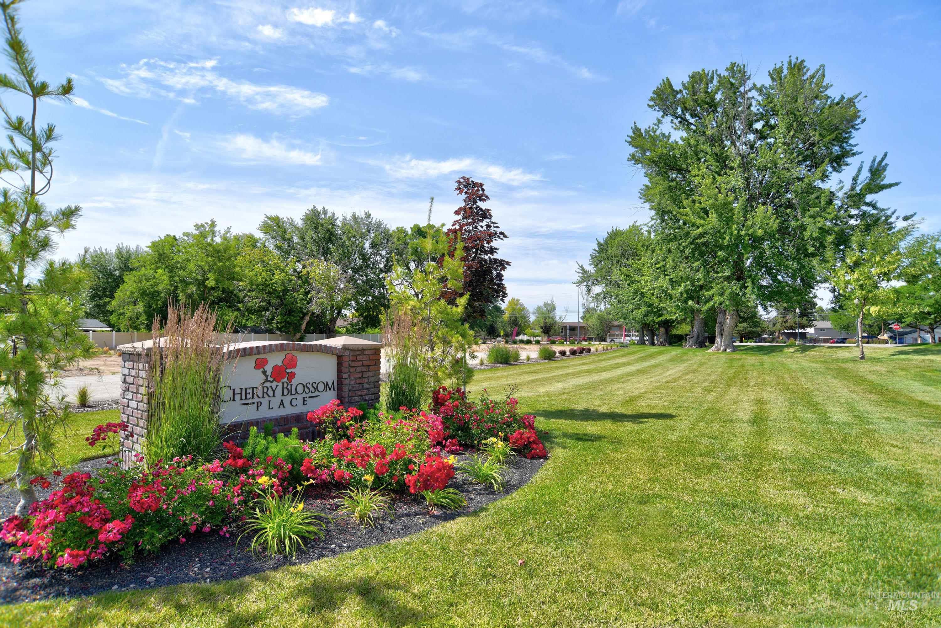 1469 North Parkshire Way Meridian, ID 83642 - Photo 39 of 43 Community sign featuring a lawn