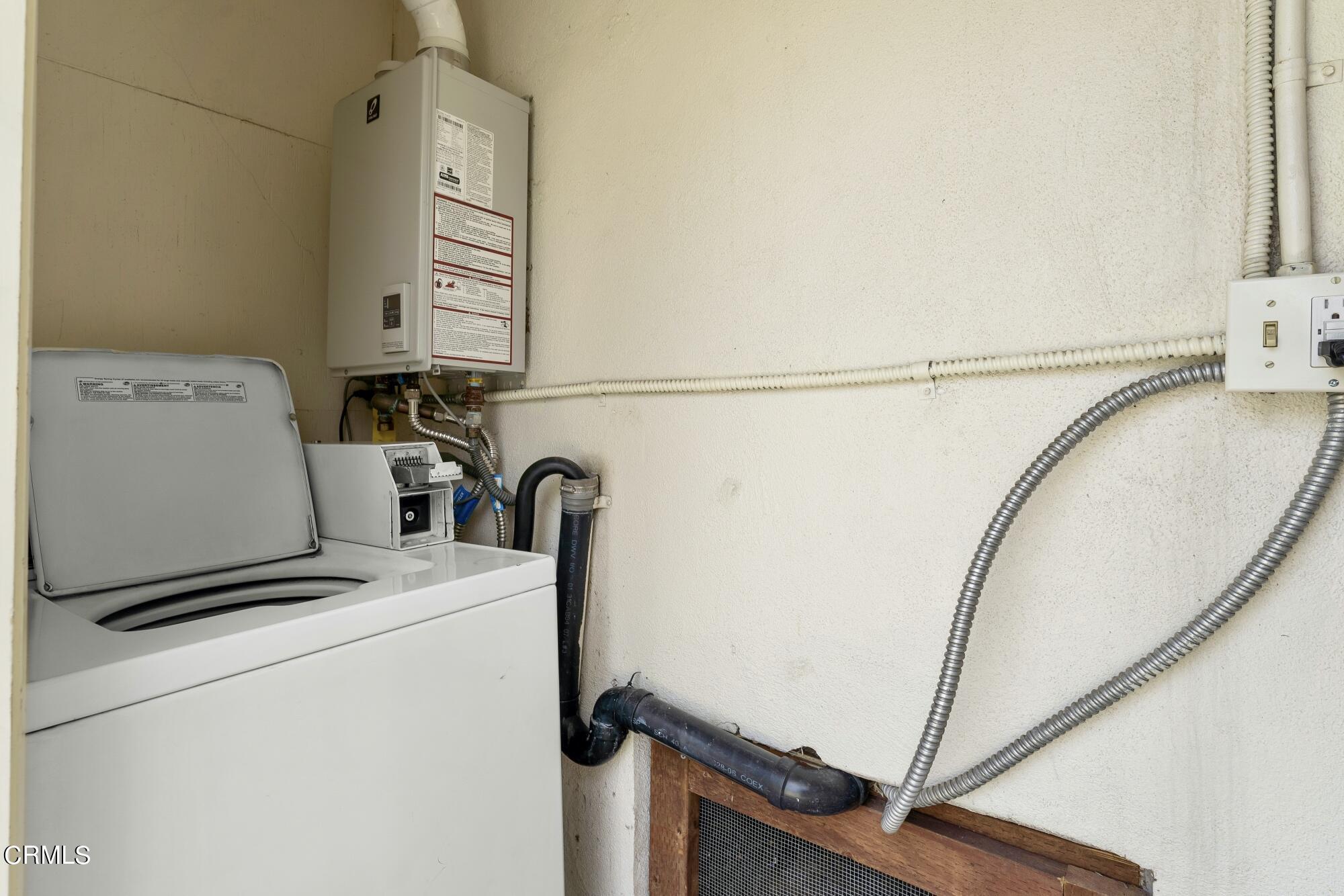 88 South Berkeley Avenue Pasadena, CA 91107 - Photo 13 of 23 a view of storage and utility room with washer and dryer