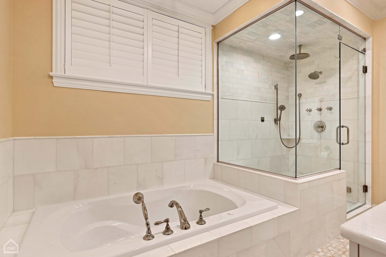 2242 North Seminary Avenue, Unit 1 Chicago, IL 60614 - Photo 17 of 37 a bathroom with a tub and a shower