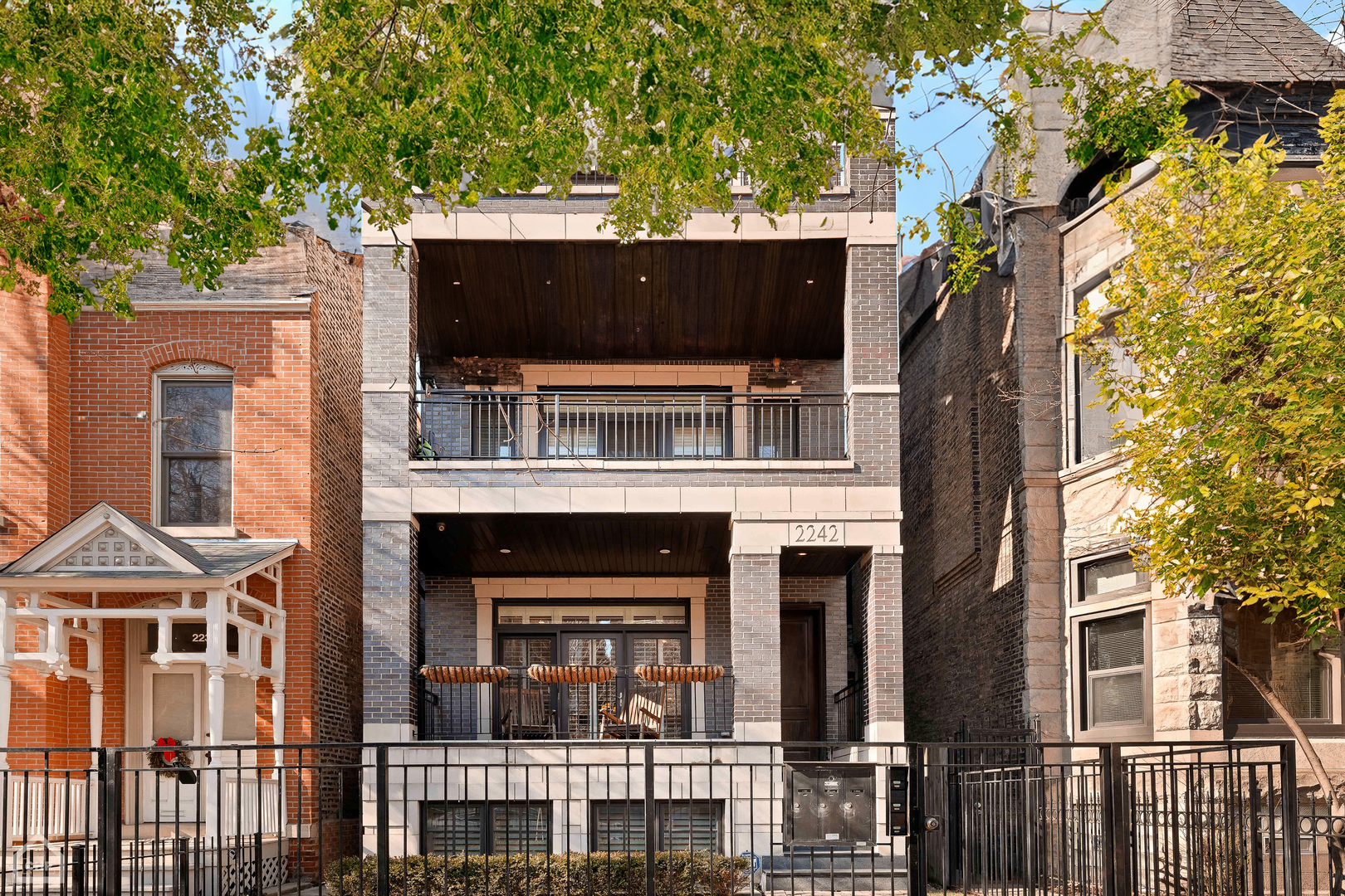 2242 North Seminary Avenue, Unit 1 Chicago, IL 60614 - Photo 2 of 37 a front view of a house with a yard